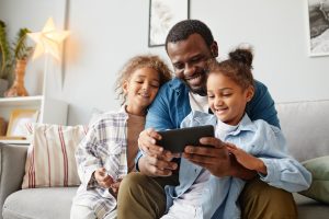 Happy Father with Two Kids